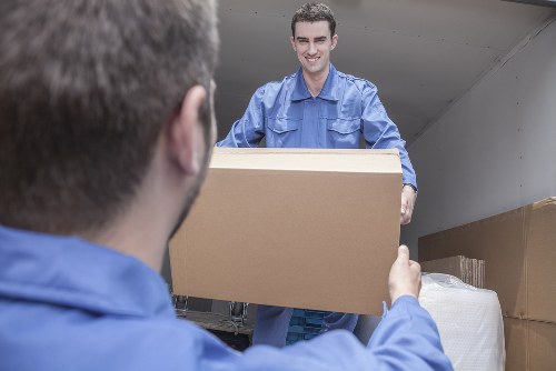 Moving truck arranged for a Lambeth home relocation on a residential street