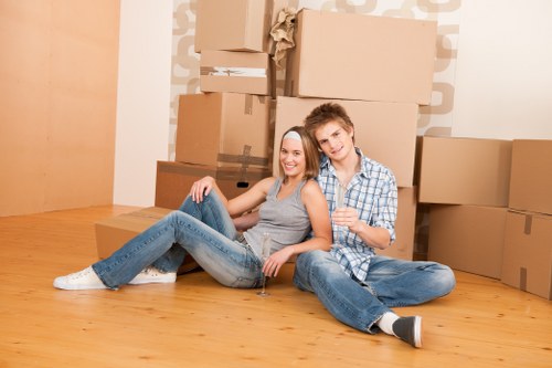 Experienced Lambeth movers handling boxes and furniture with care