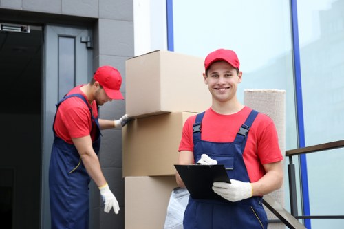 Removal team planning a move in a Lambeth street