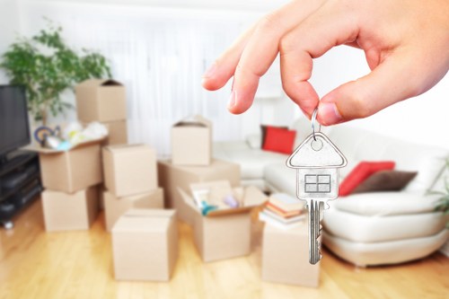 Quote calculator and moving checklist beside cardboard boxes
