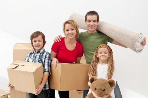 Local moving van supporting furniture collection in South London