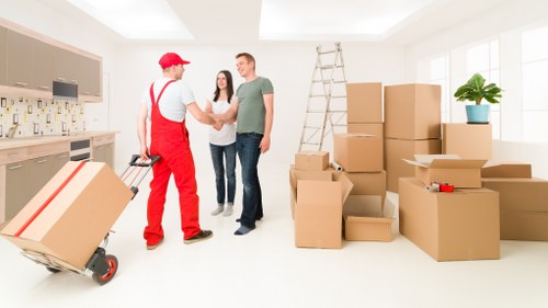 Local movers organising boxes and furniture for a Lambeth moving day