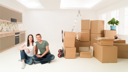 Packed boxes and furniture ready for a local move in South London
