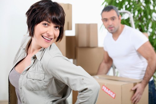 Local team handling bulky household furniture in Lambeth