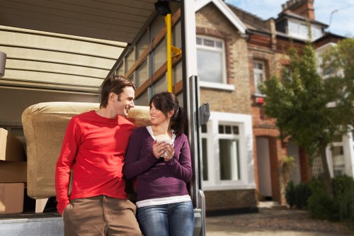 Packed boxes and furniture ready for transport in a Lambeth flat move